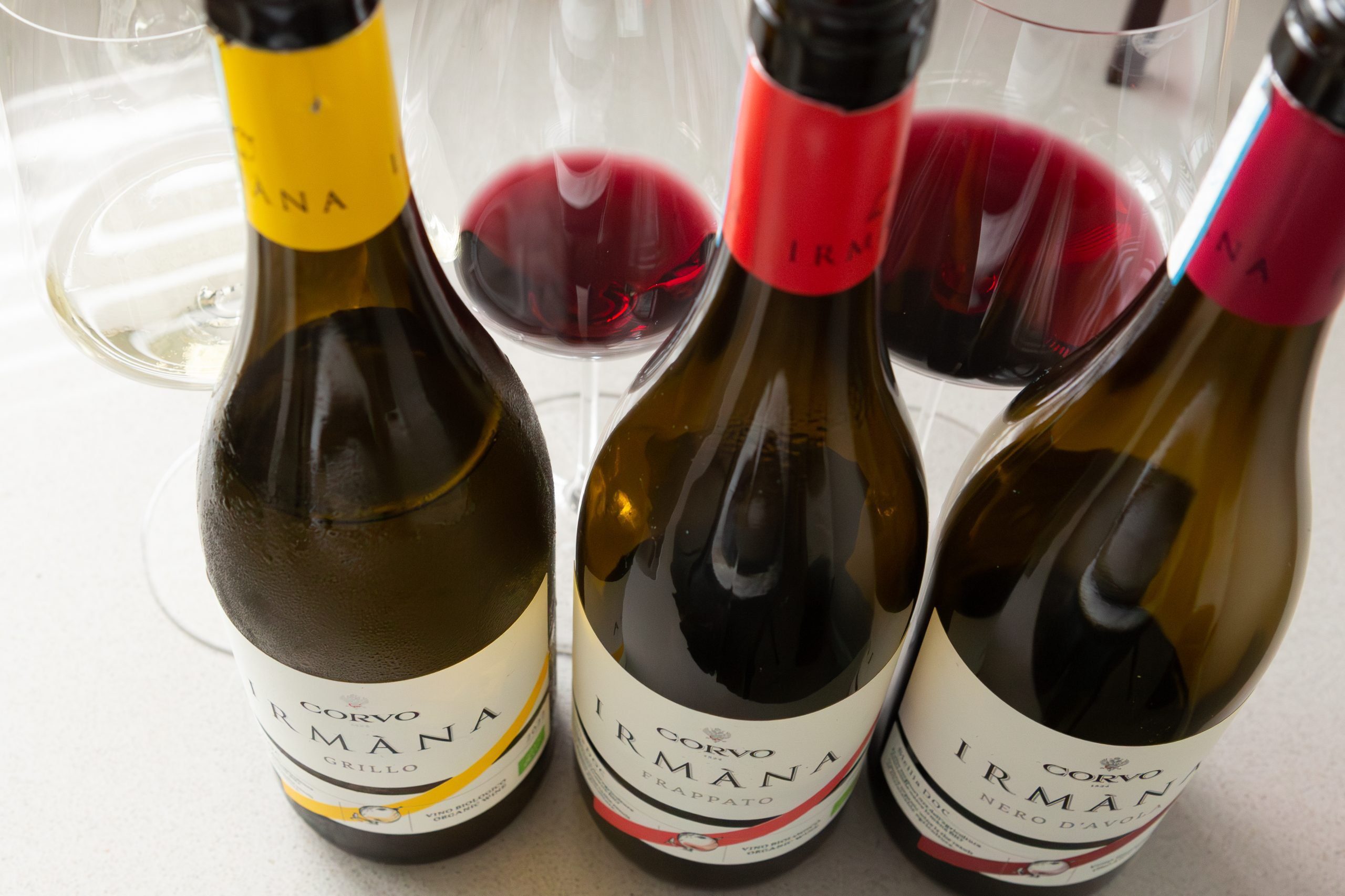 Drie flessen Irmàna Organic Line by Corvo Siciliaanse biologische wijnen